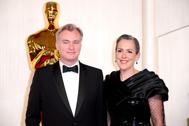 【写真を見る】クリストファー・ノーラン監督と彼を支え続けた妻でプロデューサーのエマ・トーマス
