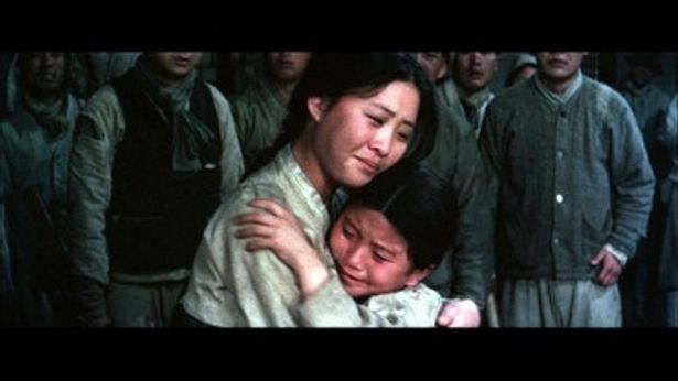 ヒロインを演じたホン・ヨンヒ(左)の姿は、北朝鮮の1ウォン札の裏面に描かれている